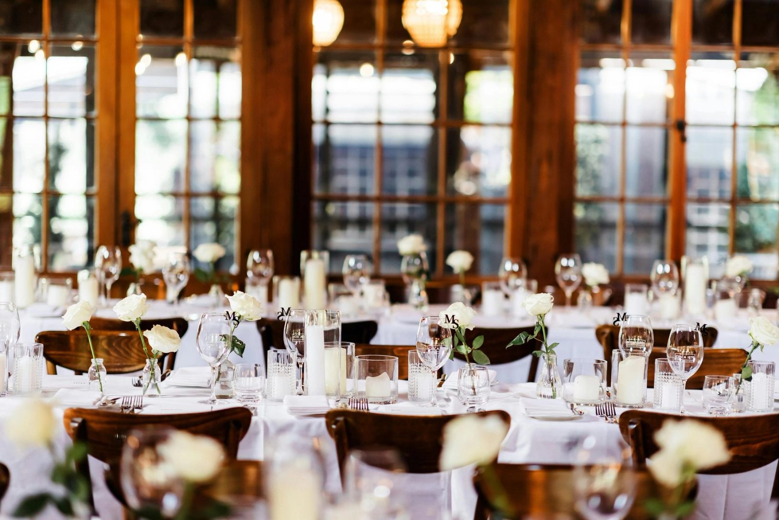 Reception tables set under the chandeliers at Circa 1876